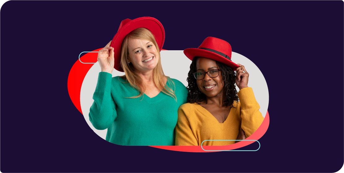 Two Red Hatters wearing their fedoras.